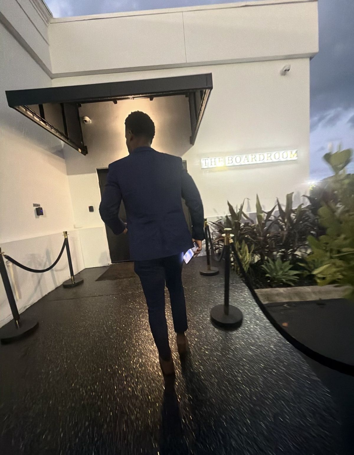 Darhyl R. Alusma entering a networking event in Fort Lauderdale